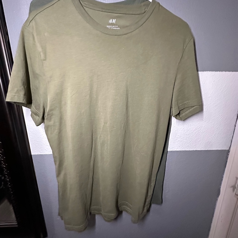 2 different green shirts